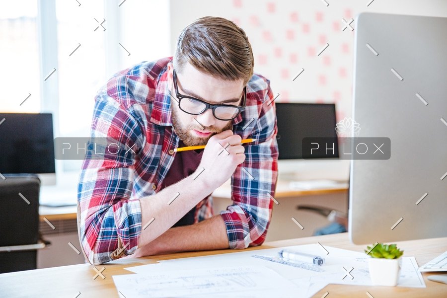 demo-attachment-98-thoughtful-creative-man-designing-project-and-PRNVMX2